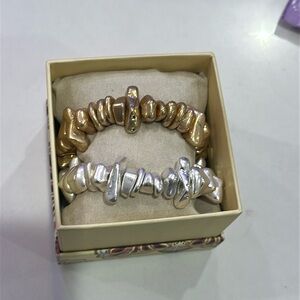 28. House of Harlow Brass two separate bracelets